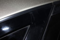 Passengersidecrackedrearwindowtrim.jpg